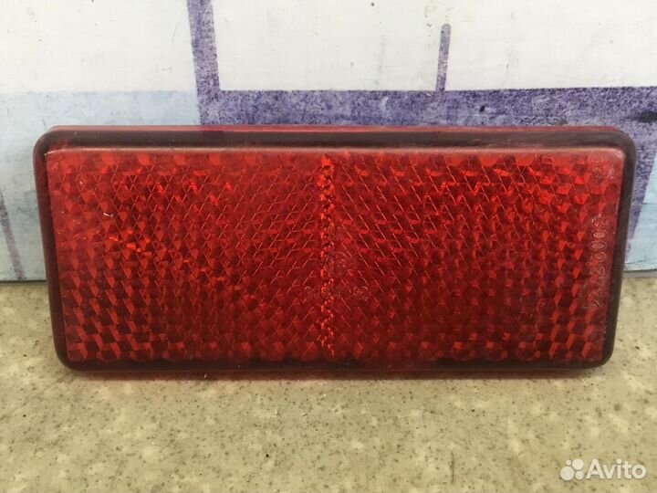 Отражатель в бампер задний левый GAZ Gazel 3221 19