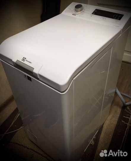 Стиральная машина с вертикальной загрузкой