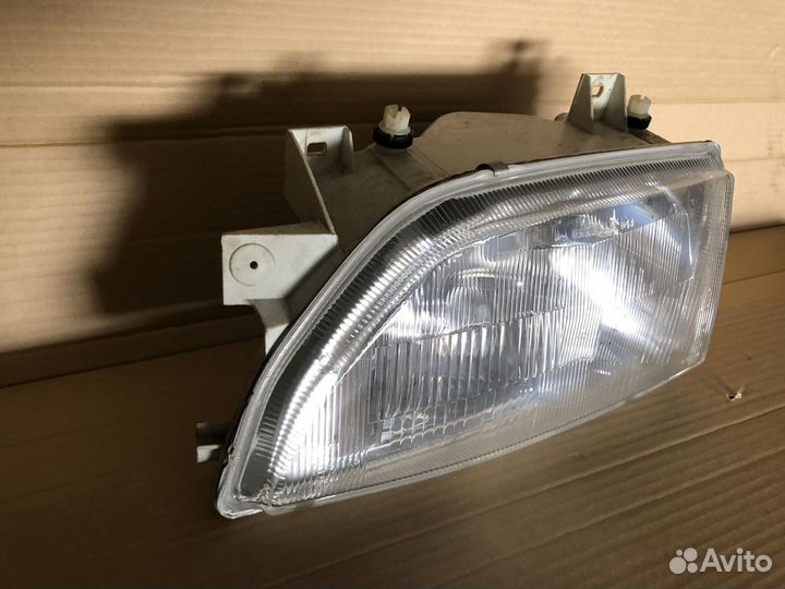Фара левая Ford Escord оригинал