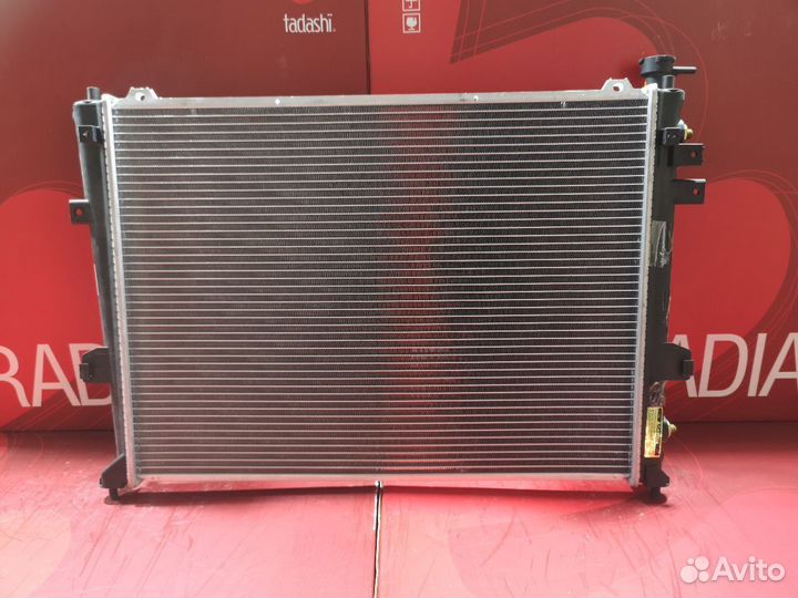 Радиатор двс Kia Carens UN G4KA