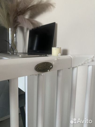 Детская кроватка овальная с маятником