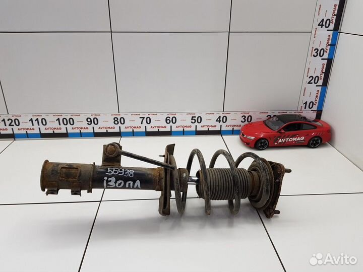 Амортизатор передний левый с пружиной
