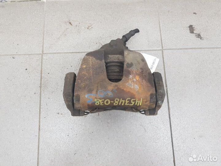 Суппорт тормозной передний левый Mazda Mazda 3