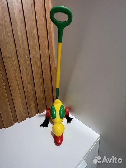 Игрушка каталка утенок