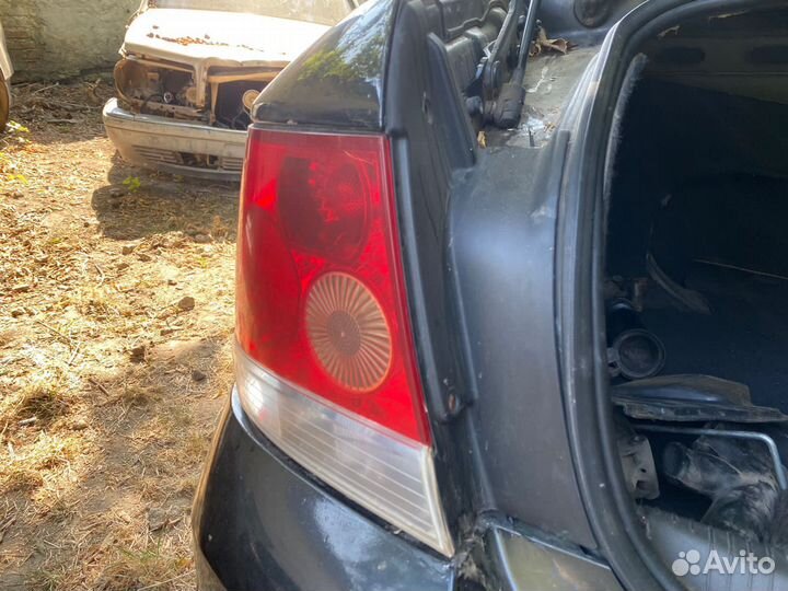 Фонарь задний левый Opel Astra H