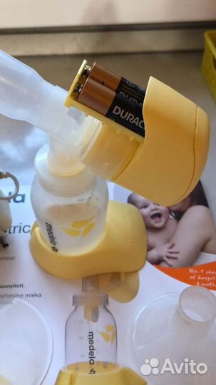 Молокоотсос medela электрический