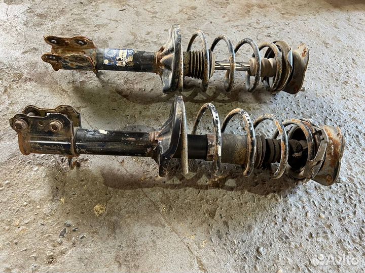 Стойка амортизатора задняя Mazda 626 GE