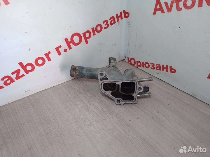 Корпус термостата Geely MK