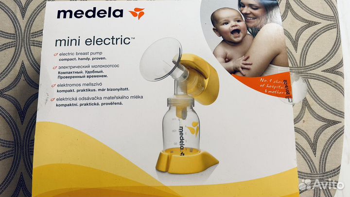 Молокоотсос medela электрический