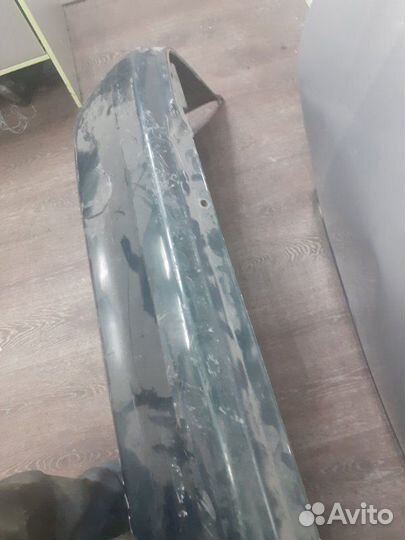 Бампер задний Mazda Familia