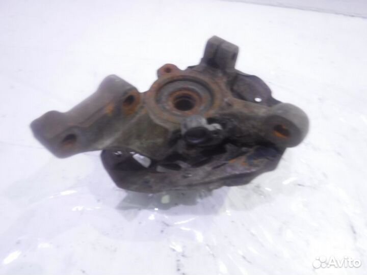 Кулак передний левый Опель