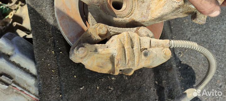 Кулак поворотный левый Пежо 206