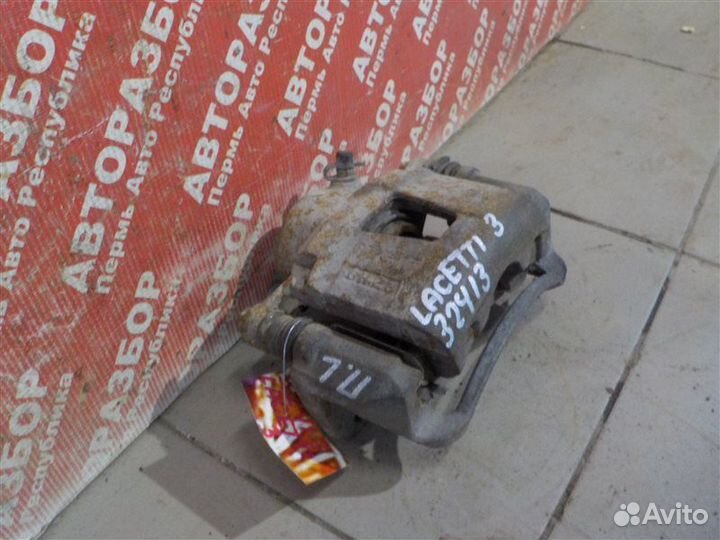 Суппорт тормозной передний левый Chevrolet Lacetti