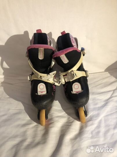 Роликовые коньки