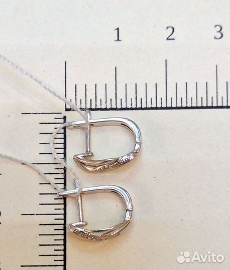 Золотые серьги с камнем