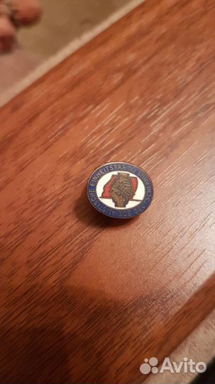 Немецкий знак партии социалистич. единства гдр