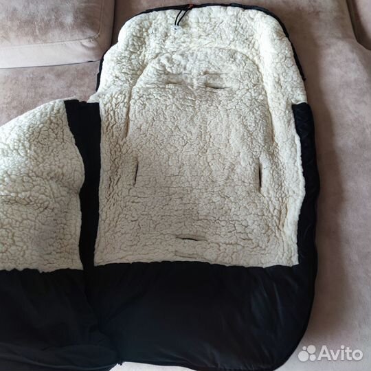 Меховой конверт в коляску овчина фирма Markus