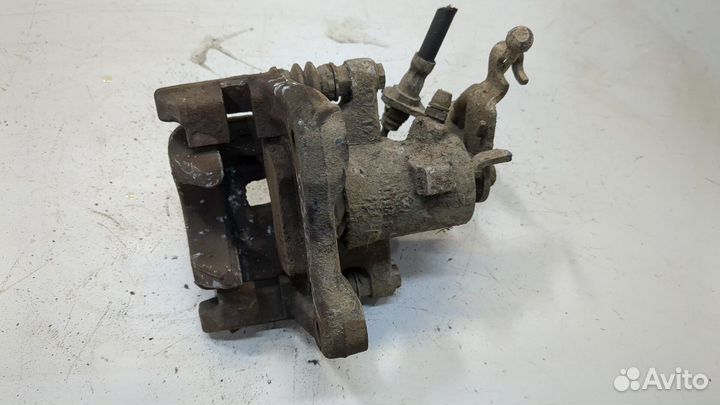 Суппорт левый задний Skoda Yeti