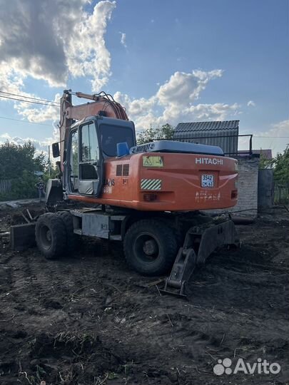Колёсный экскаватор Hitachi EX160W, 2003