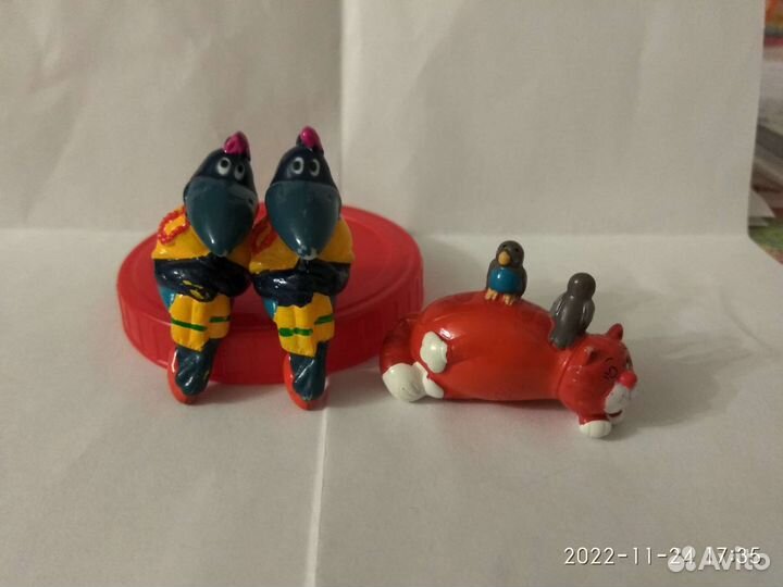 Киндер Ландрин попугай Кеша