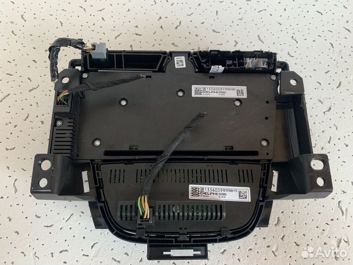 Кнопки управления магнитолой Opel Astra J GTC