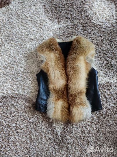 Меховая жилетка