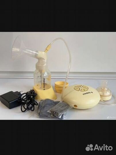 Молокоотсос medela электрический