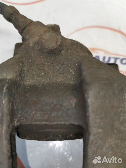 Суппорт тормозной передний правый Ford Kuga 1 2.0