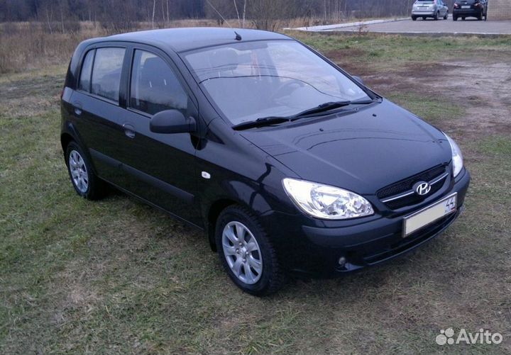 Передний бампер hyundai getz рест чёрный EB