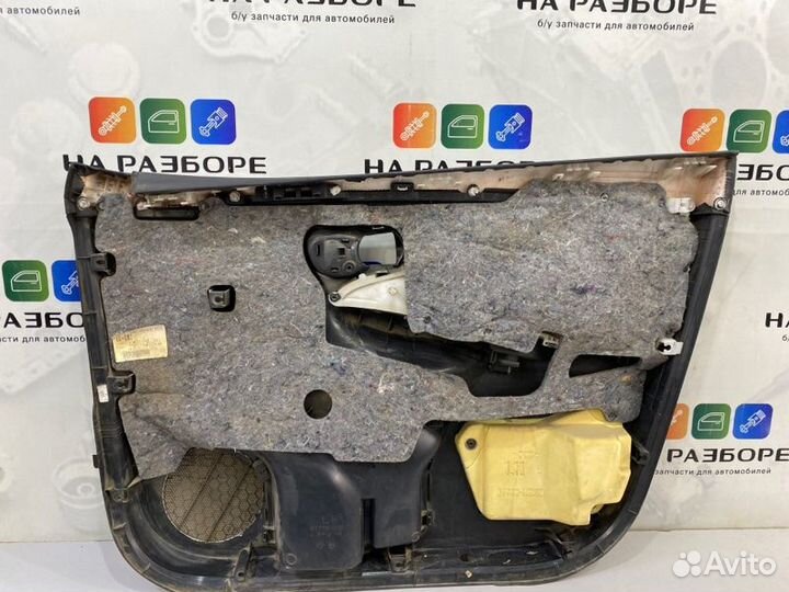 Обшивка двери передняя левая Toyota Corolla E150