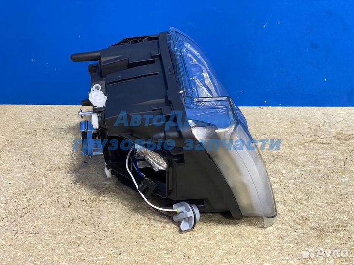 Фара Вольво FH FM левая ручная регулировка