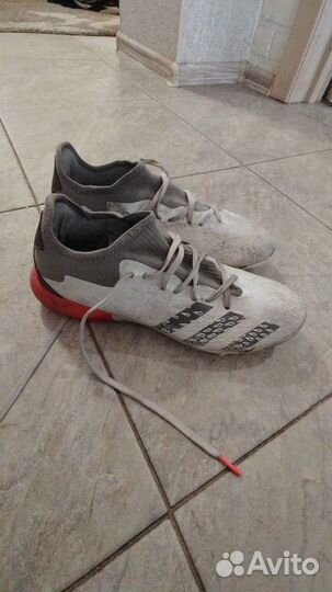 Бутсы футбольные сороконожки