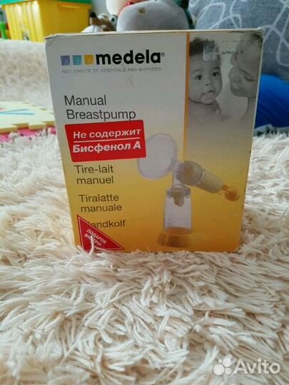 Молокоотсос Medela