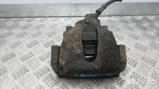Суппорт тормозной передний левый ford focus 2 (UBN
