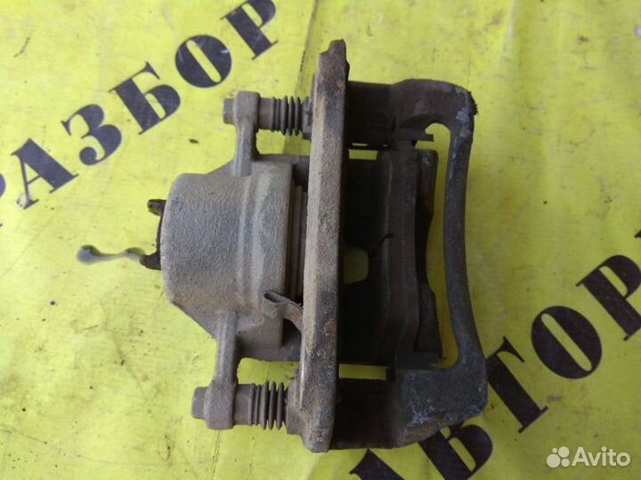 Суппорт передний левый Kia Rio 3 2011-2017 седан