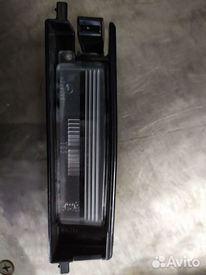 Фонарь освещения номерного знака