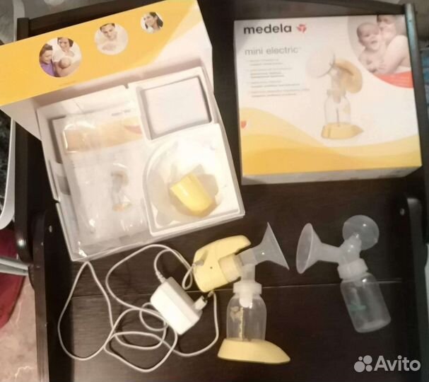 Молокоотсос medela электрический