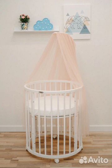 Детская кроватка с маятником