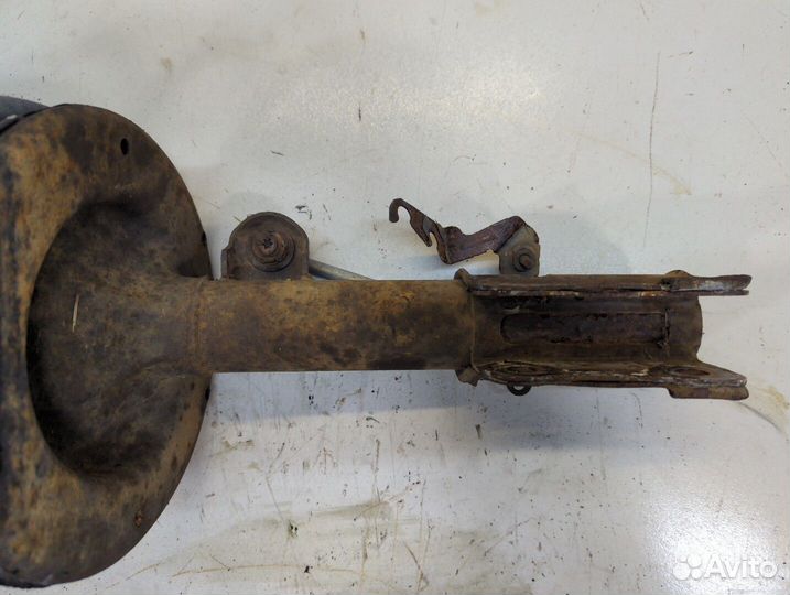 Амортизатор подвески левый передний Dodge Caravan