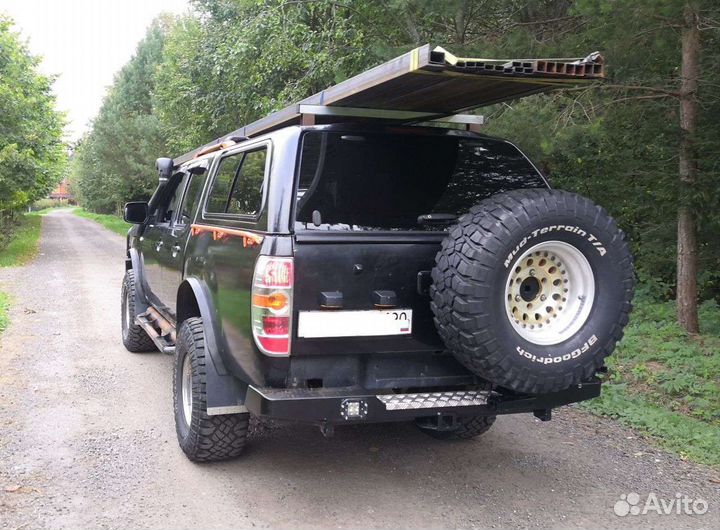 Силовой бампер риф с калиткой задний на Мазда бт50