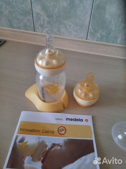 Молокоотсос ручной +набор для кормления Mebela