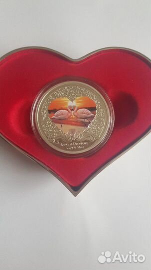 Серебряная монета в подарочной упаковке