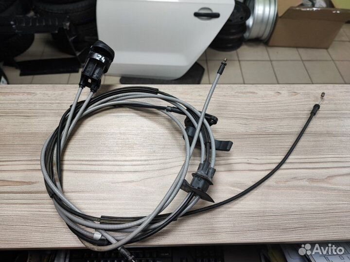 Трос коректора фар Renault Logan