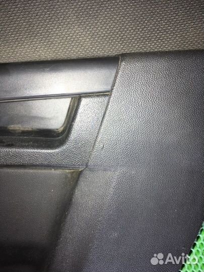Обшивка карта двери задняя правая Opel Astra H
