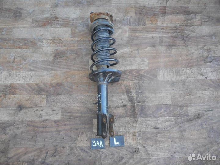 Амортизатор задний левый Kia Clarus 1996-2001