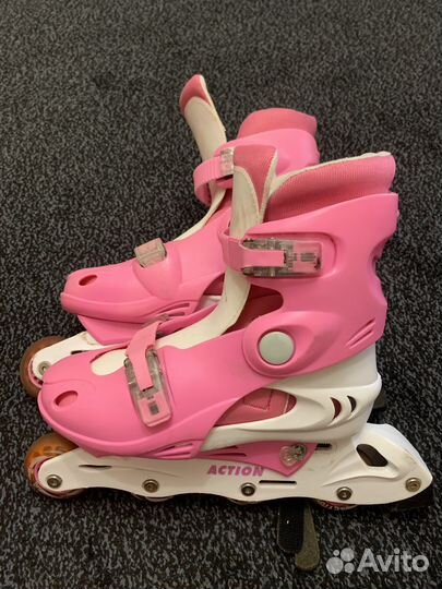 Роликовые коньки