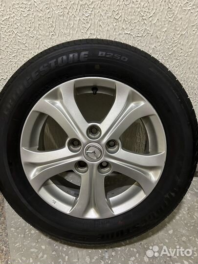 Колеса оригинал Mazda r15 летние