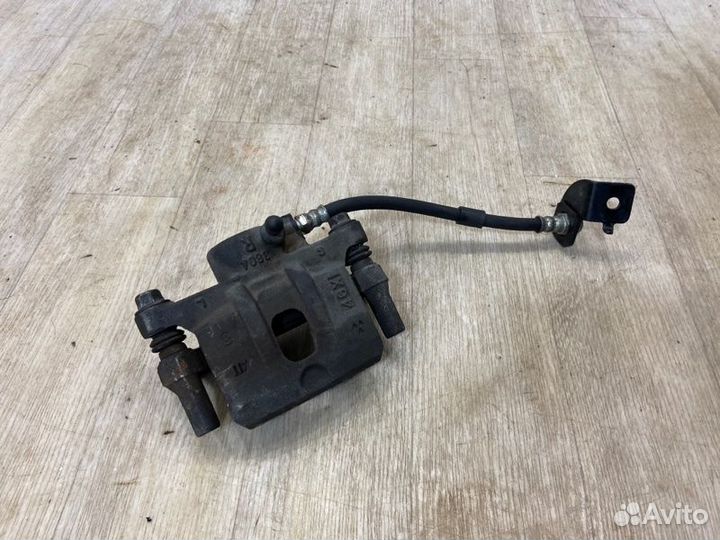 Суппорт задний правый Mitsubishi Lancer 10 CY3A