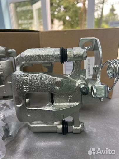 Задний суппорт (в сборе) Solaris / Rio