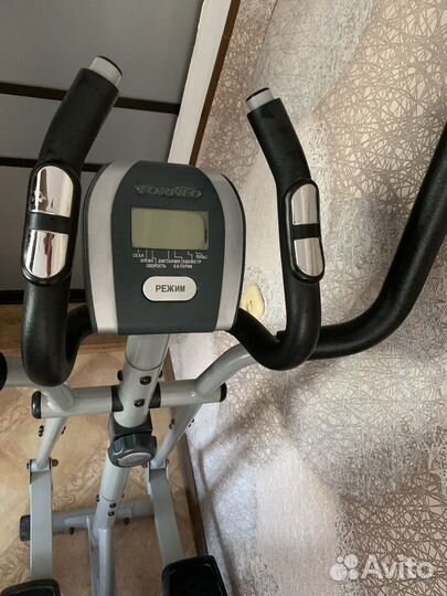 Эллиптический тренажер torneo